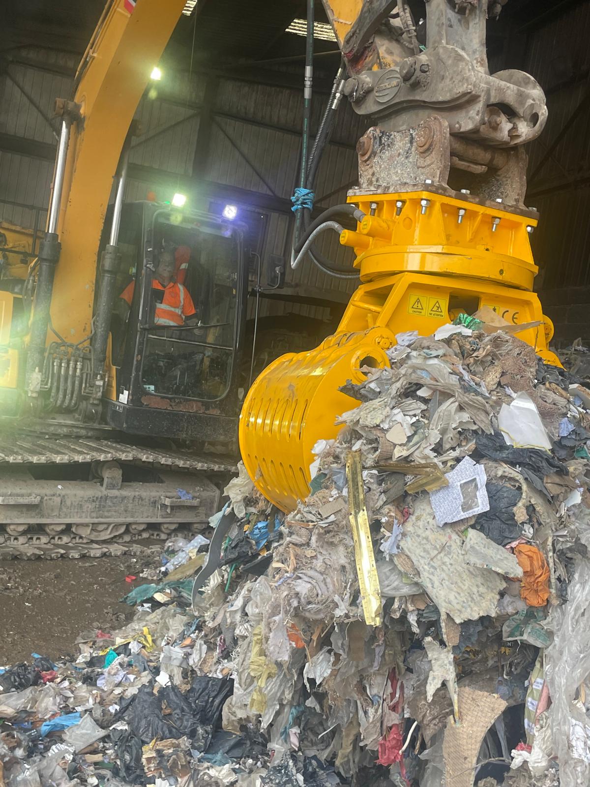 SG1000 in waste transfer An OKB SG 1000 grab working in a waste transfer station
